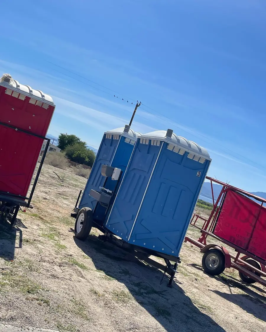 Portable toilets on a delivery trailer
